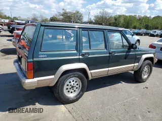 1993 Jeep Cherokee Country with VIN 1J4FJ78S4PL517648, listed as a Copart auction lot 72383564 with 127,156 mi miles and Salvage Title. Bid and sale history available at carsss.com. Image 3.