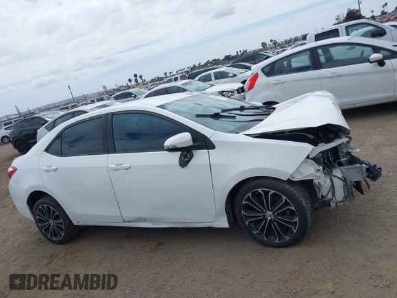 2014 Toyota Corolla L with VIN 5YFBURHE2EP085339, listed as a IAAI auction lot 42121009 with 122,339 mi miles and . Bid and sale history available at DreamBid. Image 14.