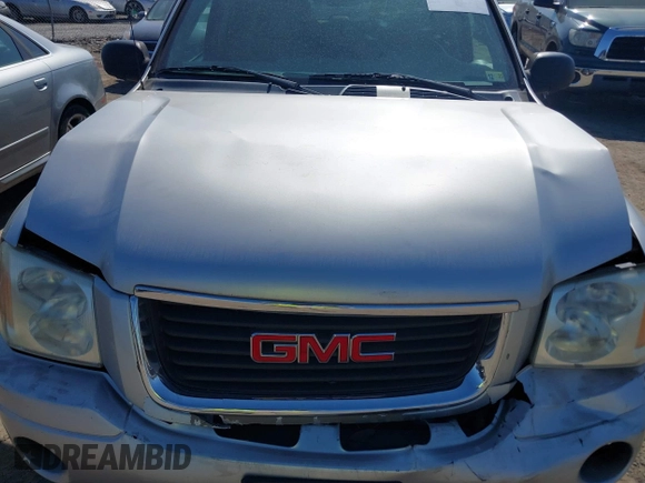 2005 GMC Envoy SLT with VIN 1GKDT13S952219826, listed as a IAAI auction lot 41783713 with 212,908 mi miles. Bid and sale history available at carsss.com. Image 10.