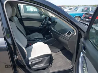 2016 Mazda CX-5 Grand Touring z VIN JM3KE2DY2G0765444, wystawiony jako IAAI lot #42527577 z przebiegiem 162 871 mil mil oraz . Historia ofert i sprzedaży dostępna na DreamBid. Obrazek 5.