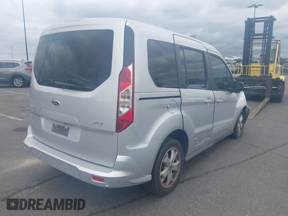 2016 Ford Transit Connect XLT with VIN NM0AE8F78G1230587, listed as a IAAI auction lot 41643706 with 98,957 mi miles and . Bid and sale history available at DreamBid. Image 4.