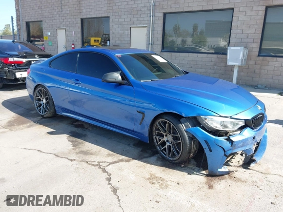 2015 BMW 4 Series 435i with VIN WBA3R1C50FF774588, listed as a IAAI auction lot 42001394 with 96,400 mi miles and . Bid and sale history available at carsss.com. Image 1.