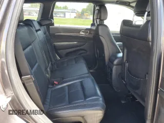 2014 Jeep Grand Cherokee Limited z VIN 1C4RJFBG5EC135501, wystawiony jako Copart lot #57359115 z przebiegiem 146 448 mil mil oraz Czysty tytuł • Clean title. Historia ofert i sprzedaży dostępna na DreamBid. Obrazek 11.