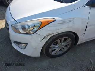 2014 Hyundai Elantra GT with VIN KMHD35LH6EU180152, listed as a IAAI auction lot 41674456 with 113,763 mi miles. Bid and sale history available at carsss.com. Image 6.