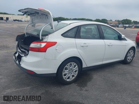 2012 Ford Focus SE with VIN 1FAHP3F25CL239383, listed as a IAAI auction lot 41656033 with 127,011 mi miles and . Bid and sale history available at DreamBid. Image 4.