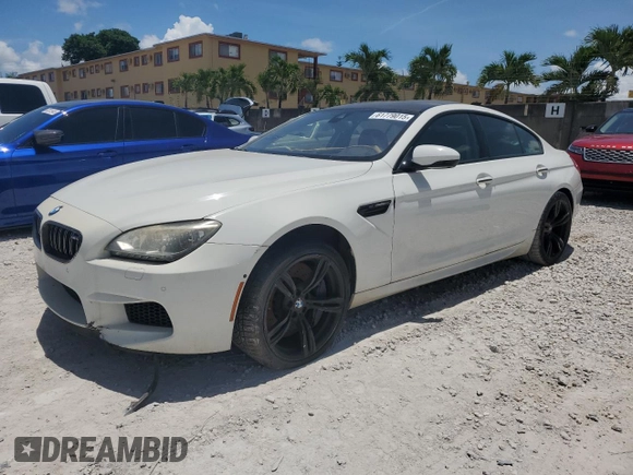 2014 BMW M6 with VIN WBS6C9C55ED467226, listed as a Copart auction lot 61779015 with Not provided miles and Salvage title. Bid and sale history available at DreamBid. Image 1.