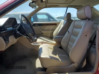 1990 Mercedes-Benz 300 CE with VIN WDBEA51D7LB137591, listed as a Copart auction lot 49811234 with 23,385 mi miles and Salvage Title. Bid and sale history available at carsss.com. Image 7.