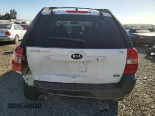 2005 Kia Sportage LX with VIN KNDJF723857134398, listed as a Copart auction lot 87893375 with 186,405 mi miles and Salvage Title. Bid and sale history available at carsss.com. Image 6.