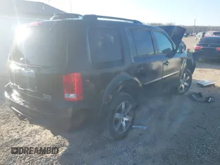 2013 Honda Pilot Touring with VIN 5FNYF4H96DB006582, listed as a IAAI auction lot 41722386 with 220,354 mi miles and . Bid and sale history available at carsss.com. Image 4.