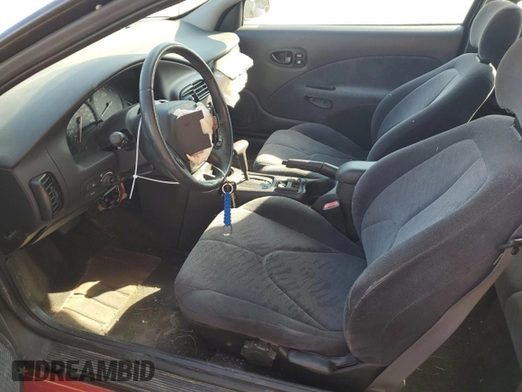 2001 Saturn SC z VIN 1G8ZY127X1Z116460, wystawiony jako Copart lot #67962944 z przebiegiem 93 372 mil mil oraz Nie do naprawy. Historia ofert i sprzedaży dostępna na DreamBid. Obrazek 7.