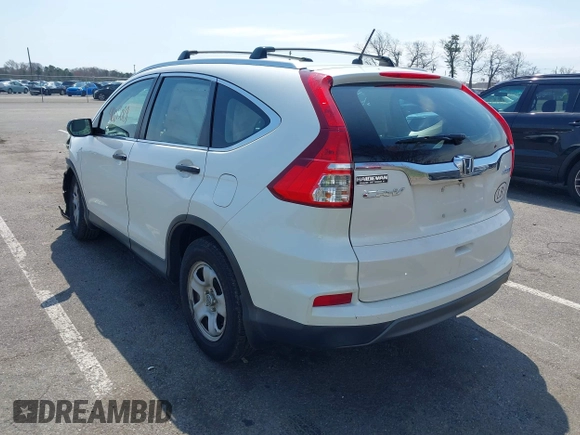2015 Honda CR-V LX with VIN 5J6RM4H39FL032027, listed as a IAAI auction lot 42013029 with 79,210 mi miles and . Bid and sale history available at DreamBid. Image 3.
