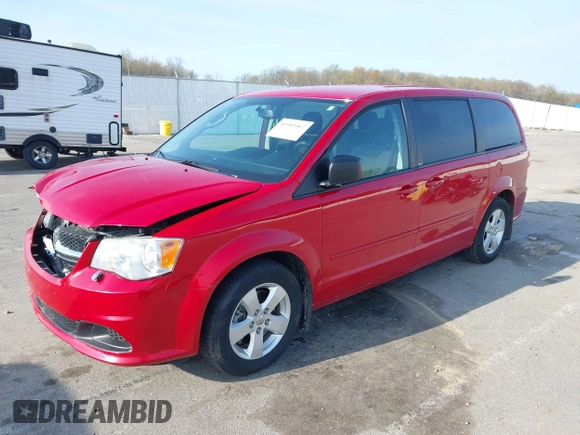 2013 Dodge Grand Caravan SE with VIN 2C4RDGBG9DR723999, listed as a IAAI auction lot 41993367 with 177,549 mi miles and . Bid and sale history available at DreamBid. Image 2.
