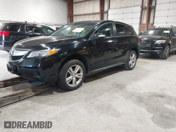 2013 Acura RDX with VIN 5J8TB4H33DL019452, listed as a IAAI auction lot 42223906 with 209,754 mi miles and . Bid and sale history available at carsss.com. Image 2.
