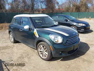 2013 MINI Cooper Countryman with VIN WMWZB3C57DWR35414, listed as a IAAI auction lot 41771890 with 141,561 mi miles. Bid and sale history available at carsss.com. Image 1.