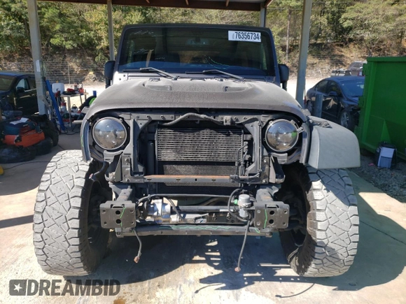 2016 Jeep Wrangler Unlimited Rubicon Hard Rock with VIN 1C4HJWFG7GL239318, listed as a Copart auction lot 76356734 with 121,442 mi miles and Salvage Title. Bid and sale history available at carsss.com. Image 5.