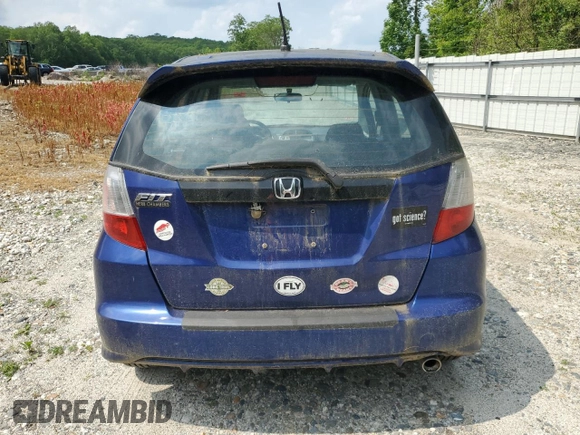 2009 Honda Fit Sport z VIN JHMGE88449S058618, wystawiony jako Copart lot #60717735 z przebiegiem 172 734 mil mil oraz Czysty tytuł • Clean title. Historia ofert i sprzedaży dostępna na DreamBid. Obrazek 6.