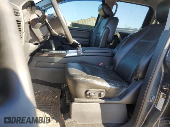 2014 Nissan Titan Pro-4X with VIN 1N6BA0EC6EN503726, listed as a Copart auction lot 86565894 with 266,399 mi miles and Salvage title. Bid and sale history available at DreamBid. Image 7.