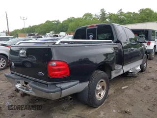 2003 Ford F-150 XL with VIN 1FTRX07W73KD29879, listed as a IAAI auction lot 42356048 with Not provided miles and . Bid and sale history available at DreamBid. Image 4.
