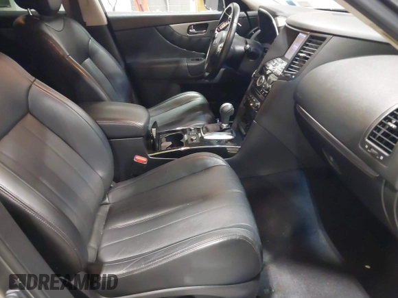 2017 Infiniti QX70 z VIN JN8CS1MU3HM143799, wystawiony jako IAAI lot #41554527 z przebiegiem 70 453 mil mil oraz . Historia ofert i sprzedaży dostępna na DreamBid. Obrazek 5.