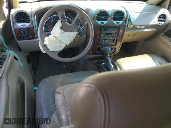 2004 GMC Envoy SLT с VIN 1GKDS13S942270065, выставлен на аукционе Copart как лот 52803515 с пробегом 242 026 миль миль и Списание • Salvage title. История ставок и продаж доступна на DreamBid. Изображение 8.