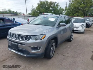2019 Jeep Compass Limited with VIN 3C4NJCCB9KT793631, listed as a IAAI auction lot 41933473 with 124,216 mi miles. Bid and sale history available at carsss.com. Image 2.