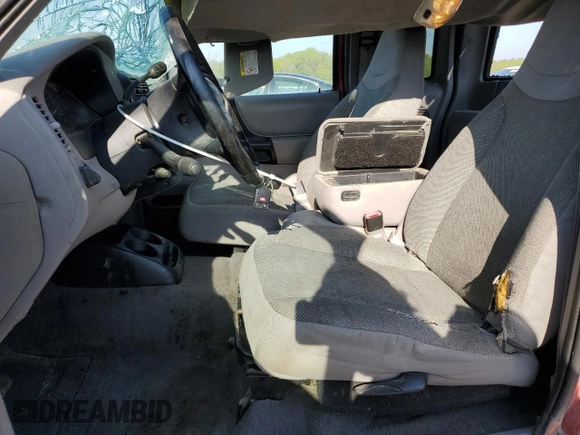2000 Ford Ranger XLT z VIN 1FTZR15X9YPA91426, wystawiony jako Copart lot #52104665 z przebiegiem 182 145 mil mil oraz Szkoda całkowita • Salvage title. Historia ofert i sprzedaży dostępna na DreamBid. Obrazek 7.
