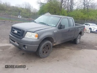 2007 Ford F-150 STX with VIN 1FTRX14W27NA19489, listed as a IAAI auction lot 42017455 with 222,297 mi miles. Bid and sale history available at carsss.com. Image 2.