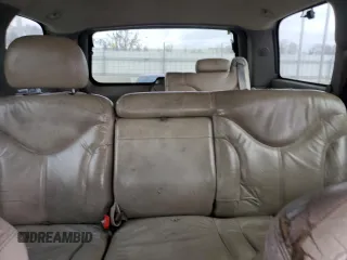 2001 GMC Yukon SLT z VIN 1GKEC13T51J145673, wystawiony jako Copart lot #83568954 z przebiegiem 310 415 mil mil oraz Szkoda całkowita • Salvage title. Historia ofert i sprzedaży dostępna na DreamBid. Obrazek 10.