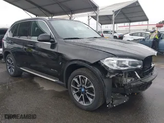 2018 BMW X5 xDrive40e iPerformance with VIN 5UXKT0C54J0V99573, listed as a IAAI auction lot 41490567 with 50,650 mi miles. Bid and sale history available at carsss.com. Image 1.
