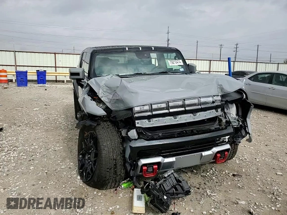 2024 GMC Hummer EV 2X z VIN 1GKB0NDE3RU110966, wystawiony jako Copart lot #79210474 z przebiegiem 3569 mil mil oraz Szkody całkowita. Historia ofert i sprzedaży dostępna na DreamBid. Obrazek 12.