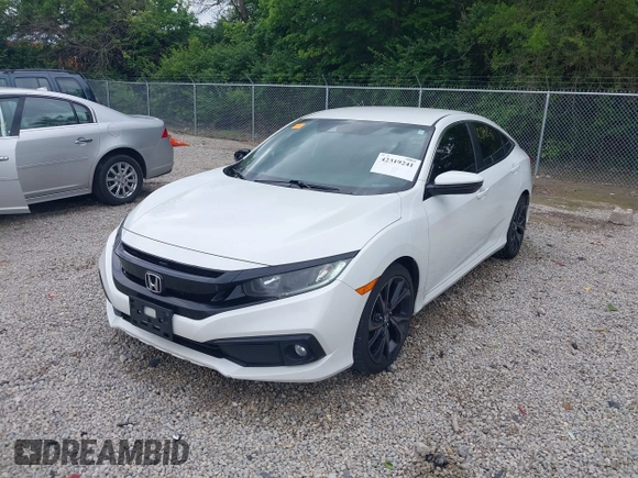 2019 Honda Civic Sport with VIN 19XFC2F85KE019311, listed as a IAAI auction lot 42319241 with 163,241 mi miles and . Bid and sale history available at DreamBid. Image 2.
