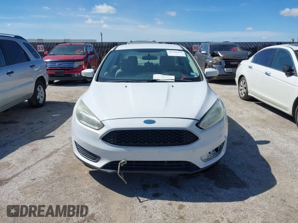 2015 Ford Focus SE with VIN 1FADP3F26FL289857, listed as a IAAI auction lot 42206474 with 111,287 mi miles and . Bid and sale history available at DreamBid. Image 6.