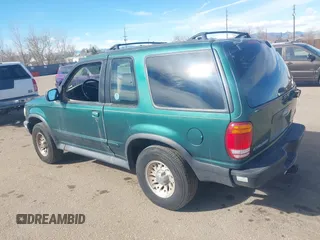 1999 Ford Explorer Sport with VIN 1FMYU22X2XUB19728, listed as a IAAI auction lot 41642358 with 128,788 mi miles and . Bid and sale history available at DreamBid. Image 3.