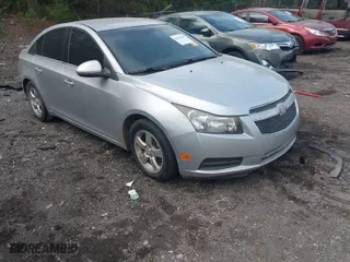 2014 Chevrolet Cruze 1LT with VIN 1G1PC5SB5E7403383, listed as a IAAI auction lot 41960344 with 141,586 mi miles. Bid and sale history available at carsss.com. Image 1.
