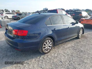 2014 Volkswagen Jetta SE with VIN 3VWD07AJ6EM417996, listed as a IAAI auction lot 42723125 with 108,952 mi miles and . Bid and sale history available at DreamBid. Image 4.