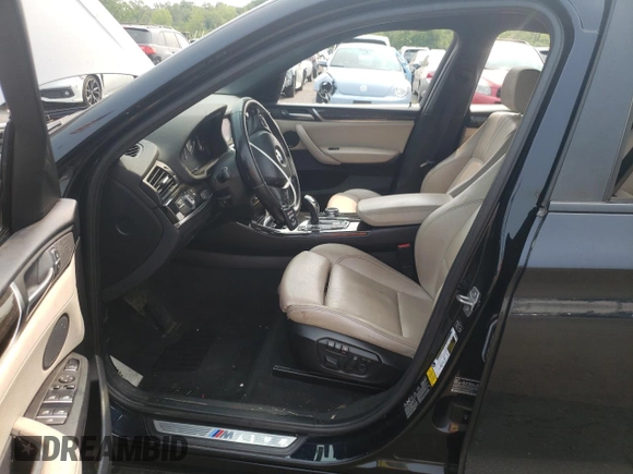 2015 BMW X4 xDrive35i with VIN 5UXXW5C59F0E87517, listed as a Copart auction lot 59604445 with 185,064 mi miles and Salvage title. Bid and sale history available at DreamBid. Image 7.