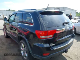 2013 Jeep Grand Cherokee Overland with VIN 1C4RJECT3DC526005, listed as a IAAI auction lot 42064151 with 112,777 mi miles and . Bid and sale history available at DreamBid. Image 3.