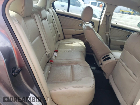 2014 Ford Taurus Limited with VIN 1FAHP2F84EG149622, listed as a Copart auction lot 63764675 with 208,801 mi miles and Salvage title. Bid and sale history available at DreamBid. Image 10.