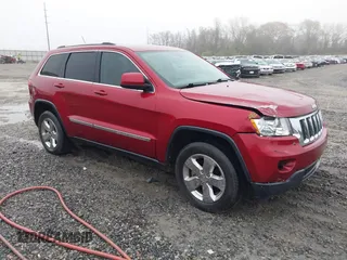 2013 Jeep Grand Cherokee Laredo with VIN 1C4RJEAG0DC516926, listed as a IAAI auction lot 41800254 with 259,006 mi miles. Bid and sale history available at carsss.com. Image 1.