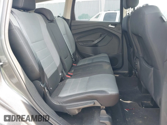 2016 Ford Escape SE z VIN 1FMCU0GX1GUC56439, wystawiony jako IAAI lot #42491397 z przebiegiem 158 785 mil mil oraz . Historia ofert i sprzedaży dostępna na DreamBid. Obrazek 8.