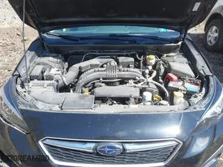 2017 Subaru Impreza Premium with VIN 4S3GTAD65H3716428, listed as a IAAI auction lot 41942299 with 77,181 mi miles. Bid and sale history available at carsss.com. Image 10.