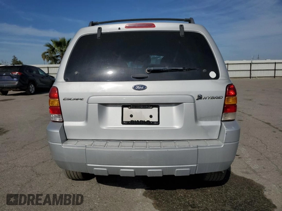 2006 Ford Escape Hybrid with VIN 1FMCU95H56KB21880, listed as a Copart auction lot 52235915 with 217,628 mi miles and Clean title. Bid and sale history available at DreamBid. Image 6.