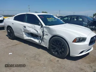 2014 Dodge Charger RT z VIN 2C3CDXCT1EH309189, wystawiony jako IAAI lot #42158197 z przebiegiem 92 074 mil mil oraz . Historia ofert i sprzedaży dostępna na DreamBid. Obrazek 1.
