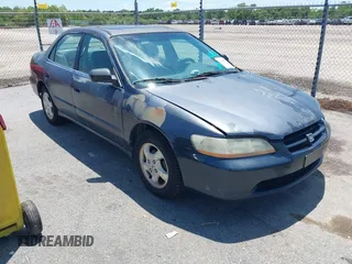 1998 Honda Accord EX z VIN 1HGCG6676WA170917, wystawiony jako IAAI lot #42242655 z przebiegiem Nie podano mil oraz . Historia ofert i sprzedaży dostępna na DreamBid. Obrazek 1.