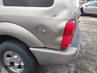 2004 Dodge Durango Limited z VIN 1D8HB58D54F166696, wystawiony jako IAAI lot #42202962 z przebiegiem Nie podano mil oraz . Historia ofert i sprzedaży dostępna na DreamBid. Obrazek 13.