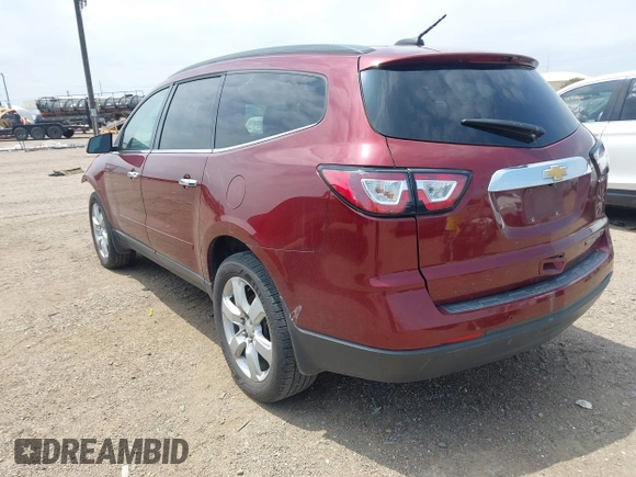 2016 Chevrolet Traverse LT with VIN 1GNKRGKD0GJ185766, listed as a IAAI auction lot 42215530 with 131,834 mi miles and . Bid and sale history available at DreamBid. Image 3.