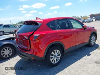 2016 Mazda CX-5 Touring with VIN JM3KE2CY6G0830409, listed as a IAAI auction lot 42049299 with 39,317 mi miles. Bid and sale history available at carsss.com. Image 4.