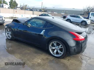 2012 Nissan 370Z Touring with VIN JN1AZ4EH4CM561303, listed as a IAAI auction lot 41788638 with 111,958 mi miles. Bid and sale history available at carsss.com. Image 3.