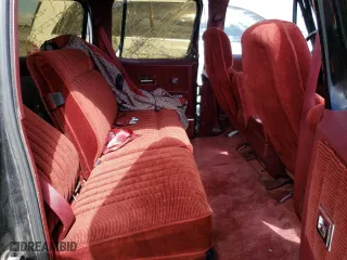 1989 Chevrolet Suburban with VIN 1GNER16K9KF194688, listed as a Copart auction lot 71224134 with 52,002 mi miles and Salvage Title. Bid and sale history available at carsss.com. Image 11.