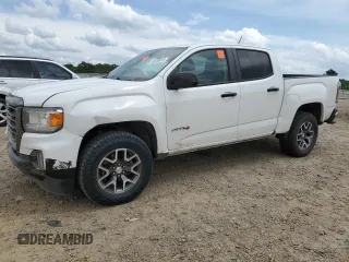 2021 GMC Canyon 4WD AT4 z VIN 1GTG6FEN2M1173135, wystawiony jako Copart lot #55228025 z przebiegiem 117 869 mil mil oraz Szkoda całkowita • Salvage title. Historia ofert i sprzedaży dostępna na DreamBid. Obrazek 1.
